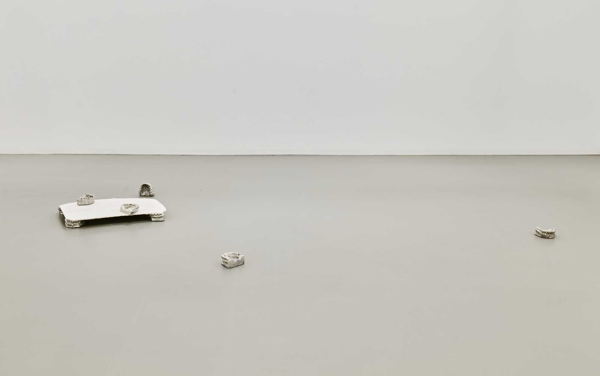 Luka Berchtold - <em>untitled bunch, </em>2022, dimensions variable, tin, plaster (c) Miro Kuzmanovic